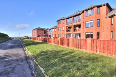 Holyrood, Park Drive, Blundellsands, partial sea views, balcony, close to sea front, 2 double bedrooms, garage.