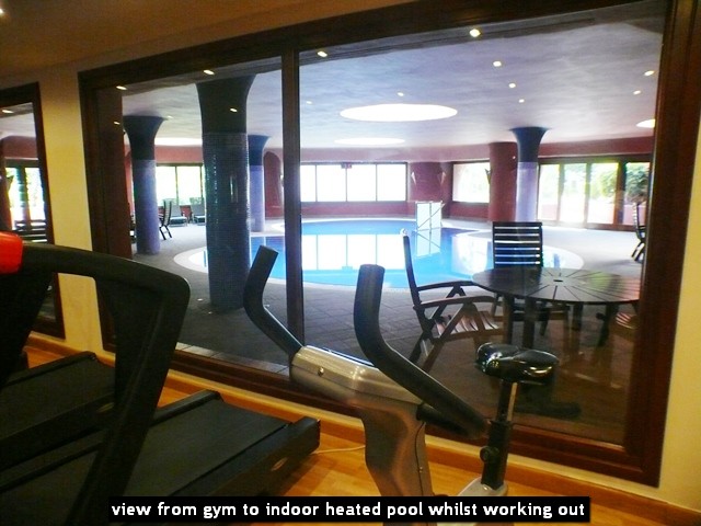 view from gym to indoor heated pool whilst working out
