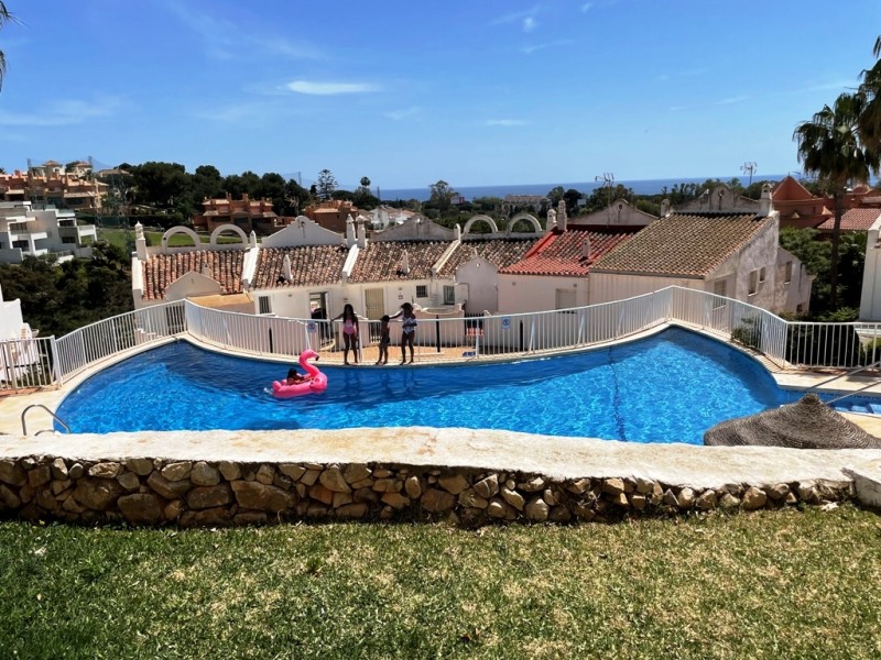 communal pool and sea views