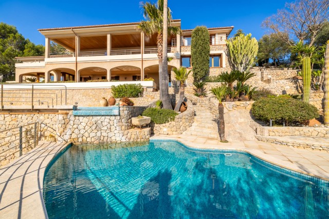 Stylish villa on an elevated plot with views over the bay and the whole of Puerto Pollensa.