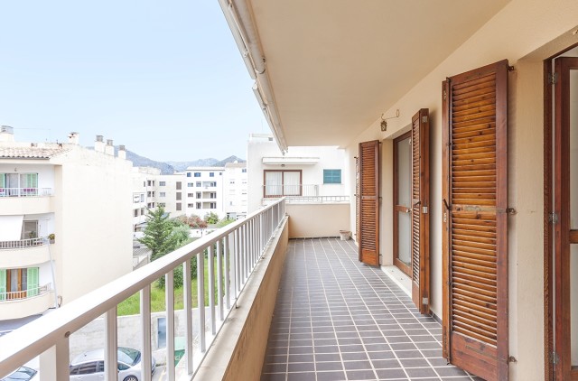 Lovely apartment with large terrace and views of the town and mountains in Puerto Pollensa