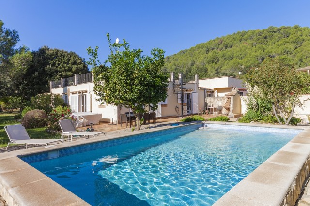 Semi detached property offering a private pool and garden with stunning mountain views