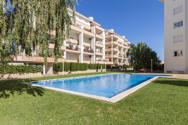 PTA1415ALC1 Attractive garden apartment for sale with mountain and lake views in Puerto Alcudia