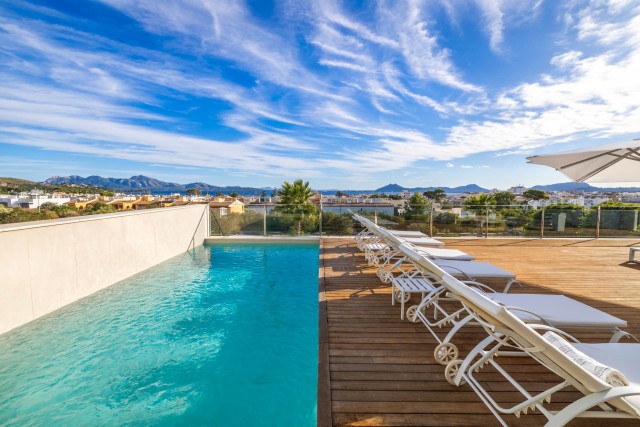 Stunning family villa with indoor and outdoor pools plus sea views in Puerto Pollensa