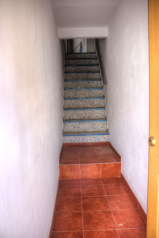 Stairs to upper apartment