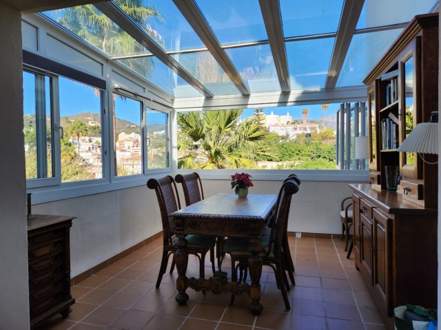 Duplex semi-detached house in Nerja with 2 bedrooms with communal pool, terraces and 60 m² garden.