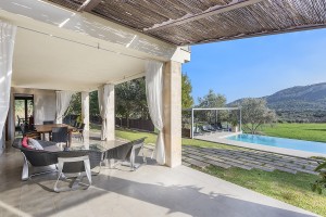 An impressive Mediterranean property with lovely mature gardens and a private pool in Pollensa