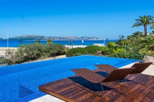 Frontline luxury villa with chic interiors and awesome views over Pollensa bay in Bonaire