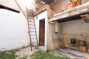 Corner town house with potential right next to the square in Pollensa
