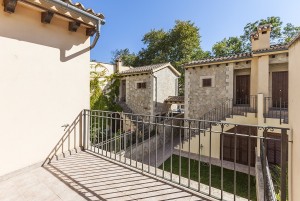 Charming semi detached house in the idyllic mountain village of Puigpunyent with small garden