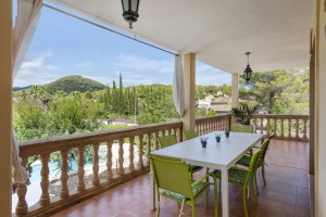 Charming villa with colonial style terraces and mature gardens near Pollensa