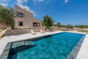 Newly built country home with generous interiors and private pool in Selva