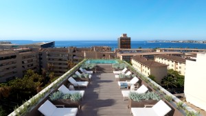 Garden apartment with a community roof terrace, pool and sea views in Palma