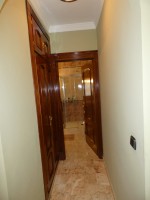hallway to en suite bathroom