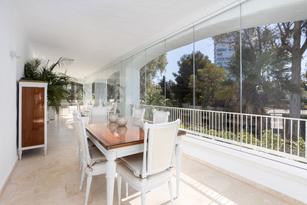 Terrace with glass curtains